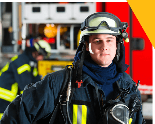 American Build Quality firefighter looking at camera